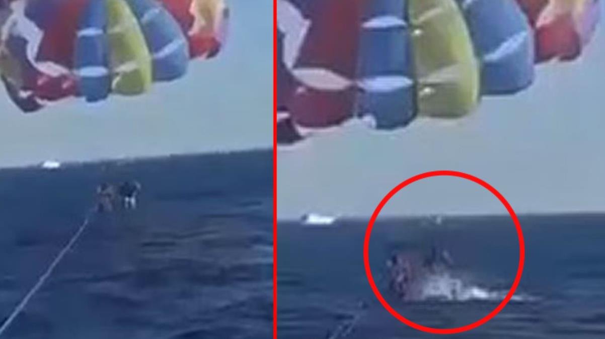 Denizde dehşet anları! Dev köpek balığı sudan bir anda çıkıp paraşütteki adamın bacağından parça kopardı