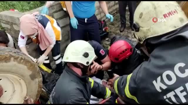 Traktör devrilince sürücü altında sıkıştı