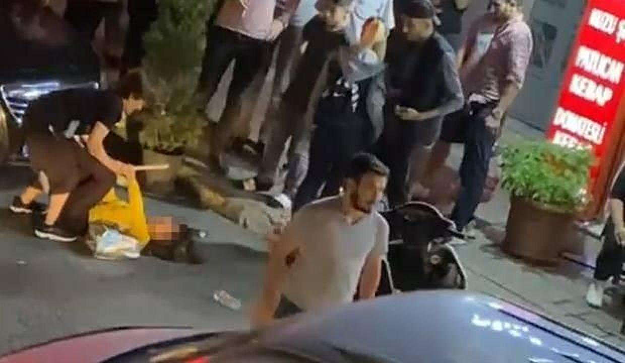 Uyuşturucu bağımlısı kızını sokak ortasında dövdü!