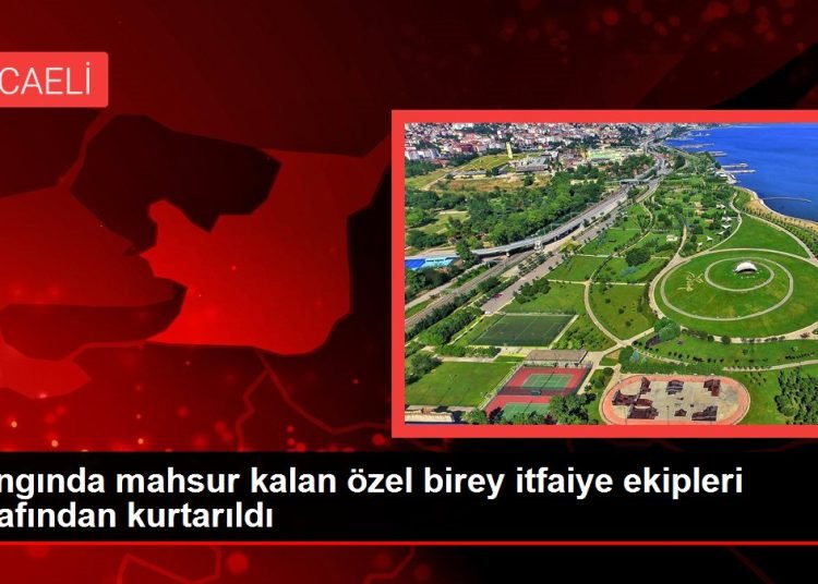 Yangında mahsur kalan özel birey itfaiye ekipleri tarafından kurtarıldı