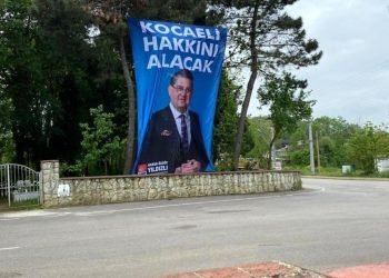 CHP milletvekili adayının seçim afişi mezarlığa asıldı