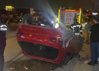 Bariyere çarparak takla atan otomobilden burunları bile kanamadan çıktılar